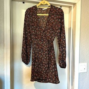 Long sleeve small floral wrap dress.